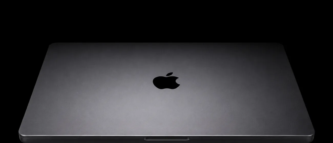 MacBook, the laptop Coop Visuals uses to design and build websites